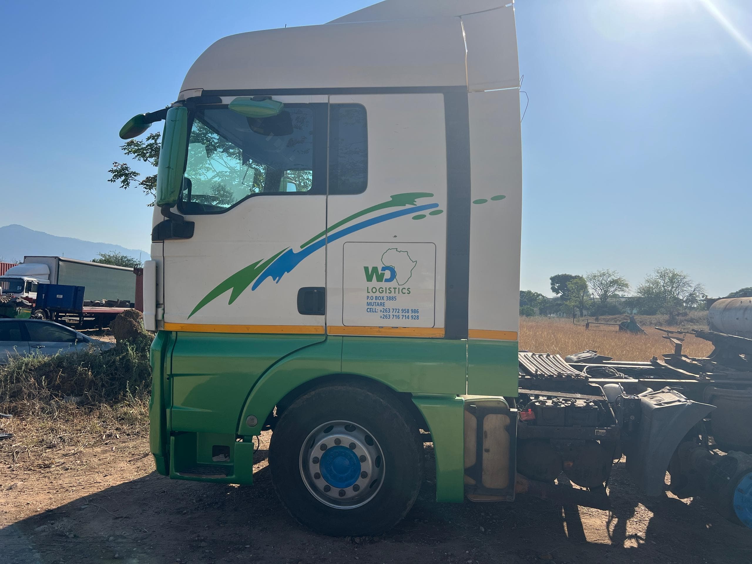 WD Logistics tipper truck, side profile